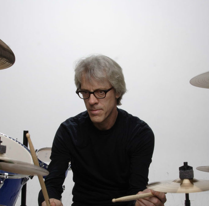 Stewart Copeland plays his new band’s material on guitar
